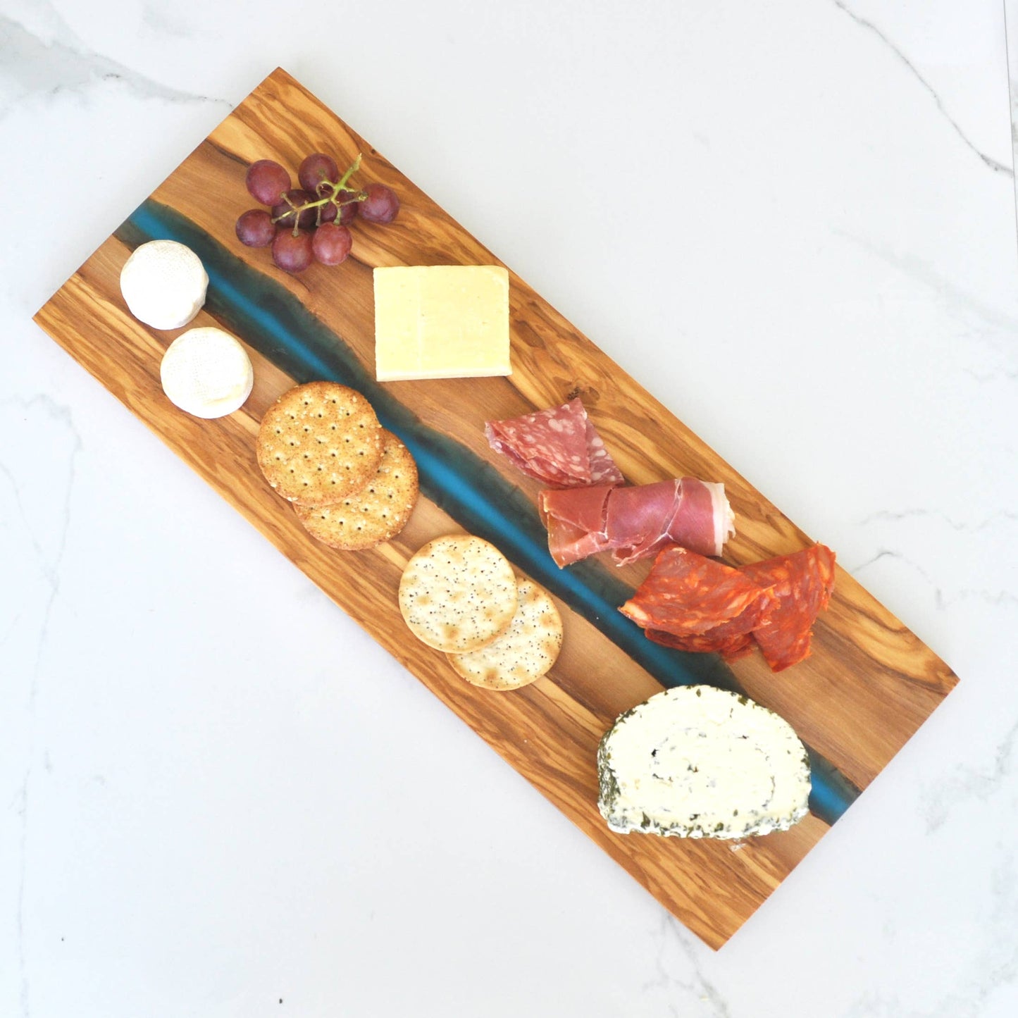 Olive Wood Cutting Board with River of Blue Resin - 15” x 6”